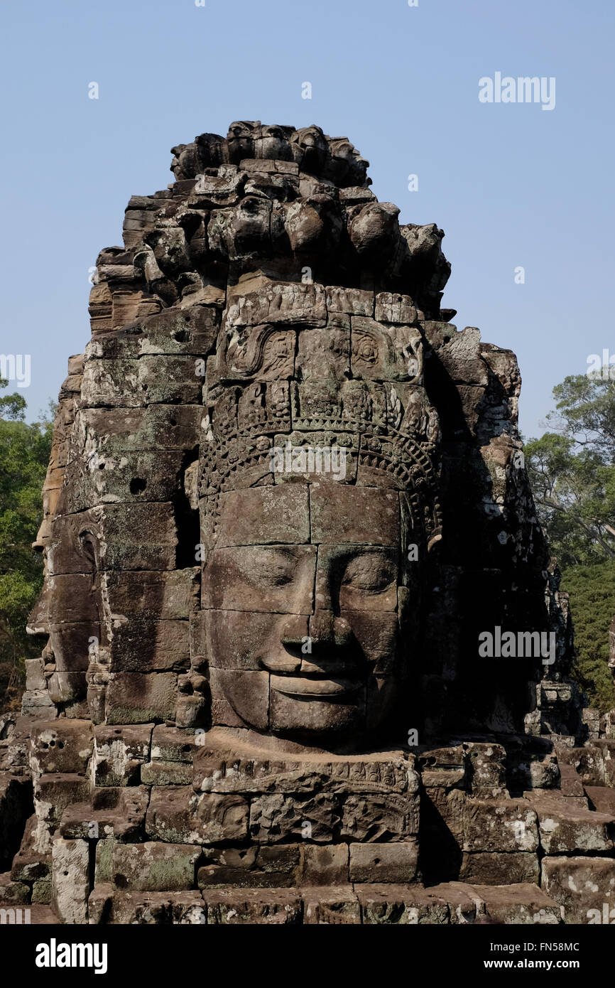 Face à la sculpture à l'intérieur du temple Bayon, Angkor Thom, près de Siem Reap, Cambodge Banque D'Images