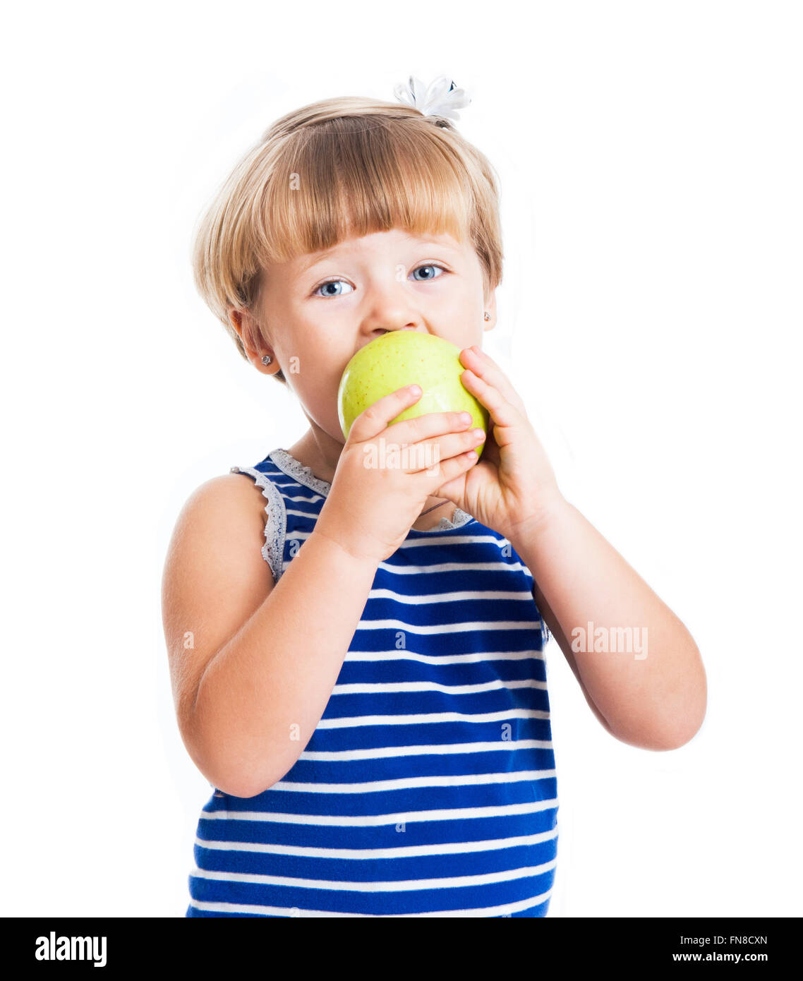 Sweet Girl eating an apple Banque D'Images