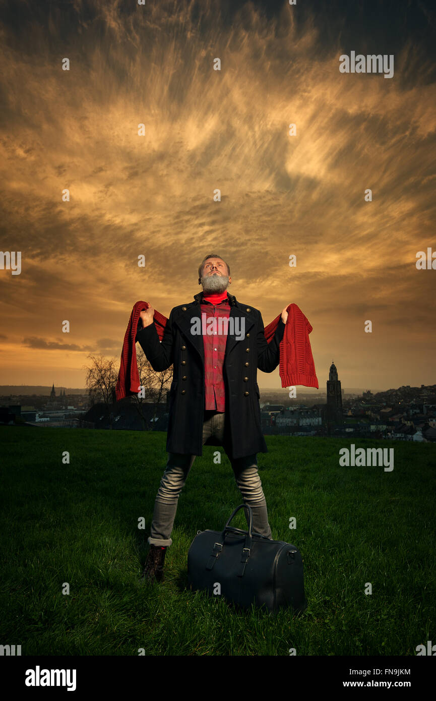 Hipster man standing in park, Cork, Irlande Banque D'Images Hipster man standing in park, Cork, Irlande Banque D'Images