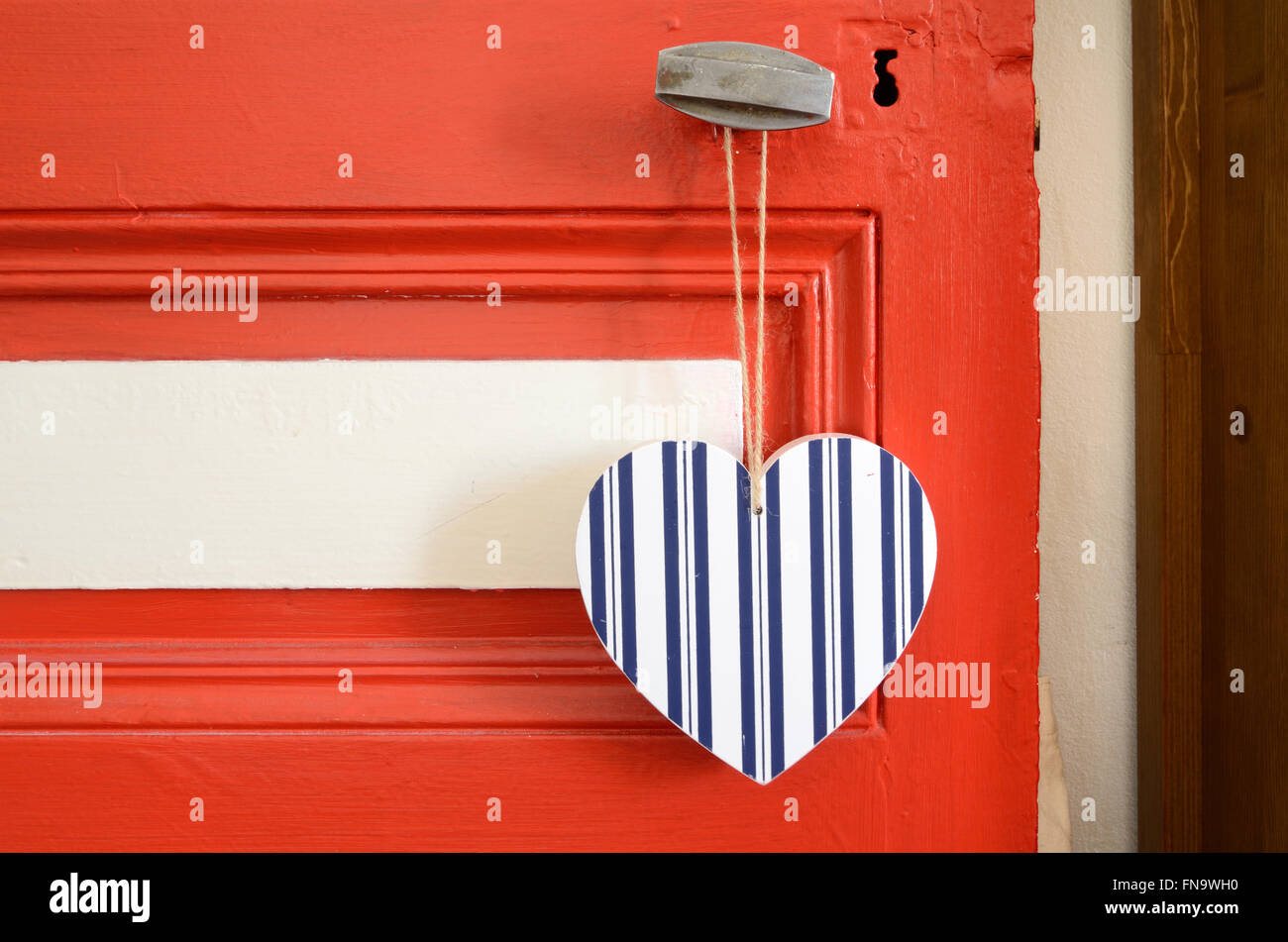 Coeur à rayures ou Heart-Shaped sur porte-clés Porte Rouge Banque D'Images