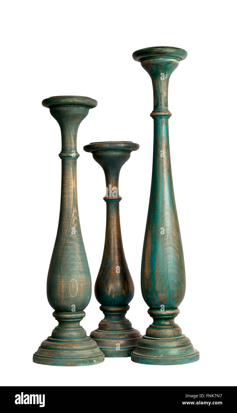 Composition du bleu-gris trois chandeliers en bois vintage Banque D'Images