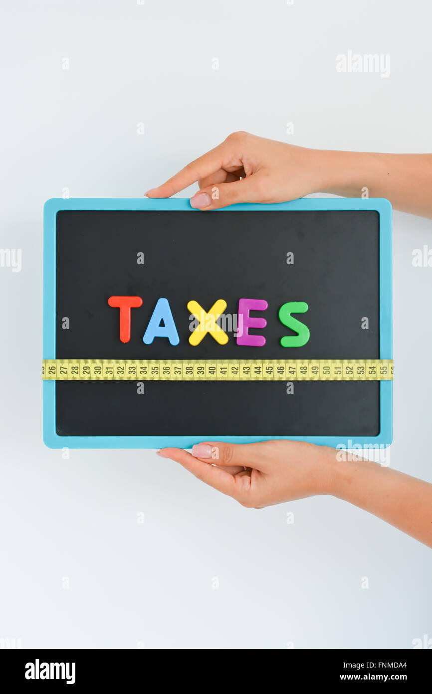 Mesurer la notion d'impôts dans le cadre d'une entreprise, la société ou l'économie Banque D'Images