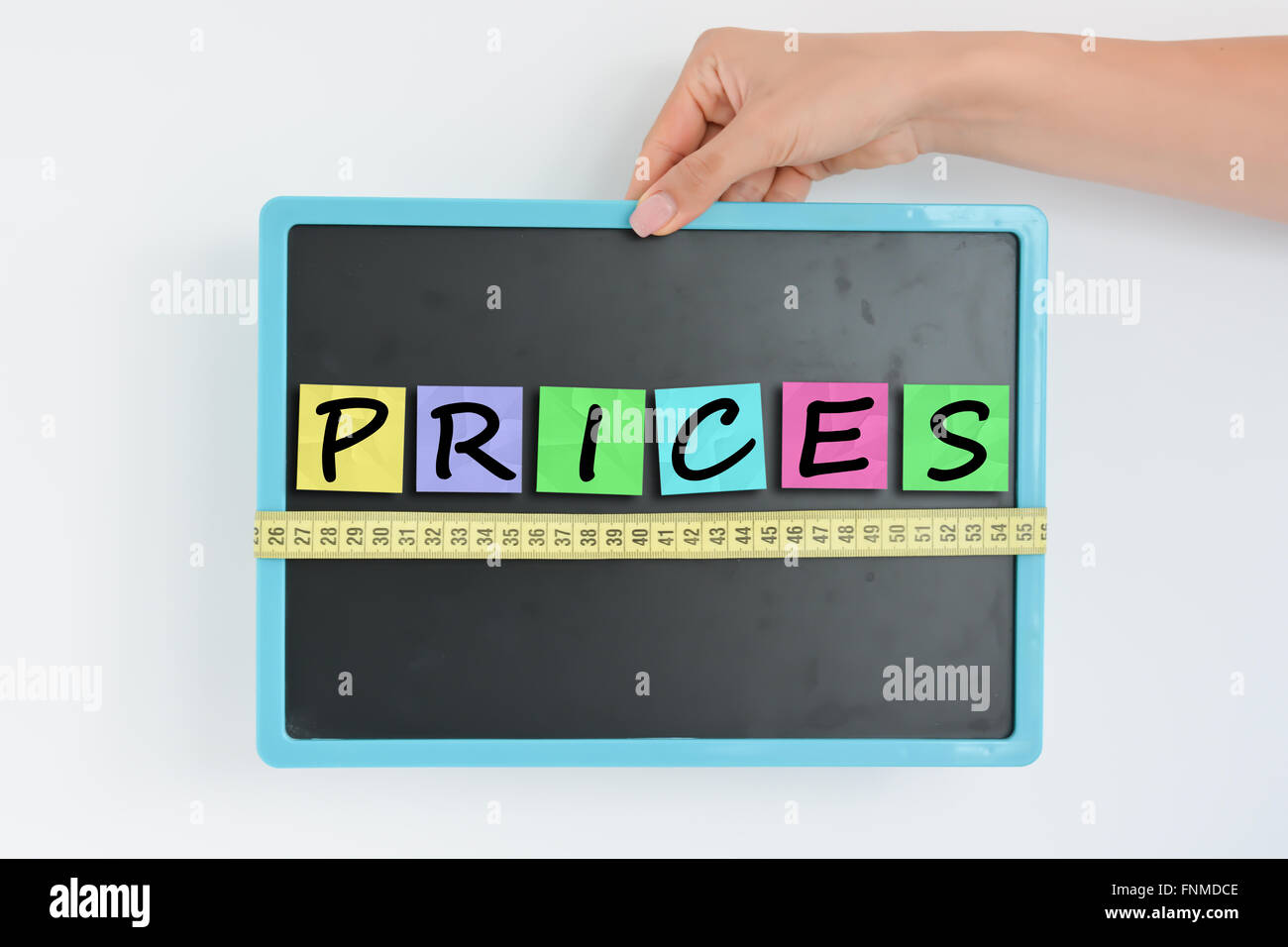 Mesure des prix concept sur tableau noir Banque D'Images