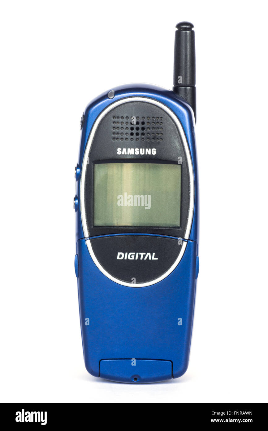 Vieille technologie téléphone portable sur un fond blanc. Banque D'Images