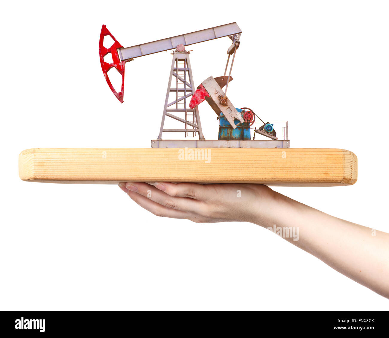 Pompe à huile sur une planche en bois sur un côté féminin Banque D'Images