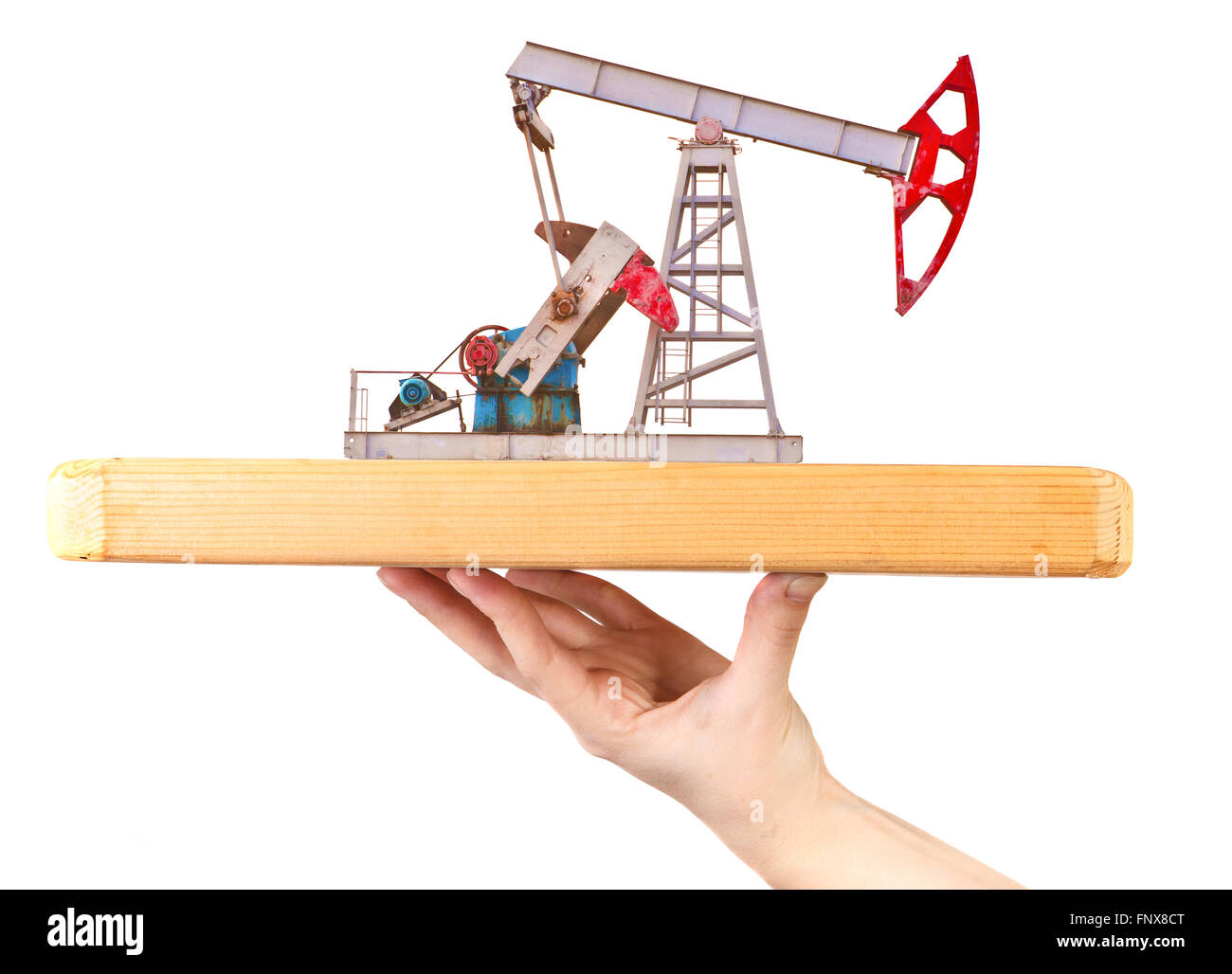 Pompe à huile sur une planche en bois sur un côté féminin Banque D'Images