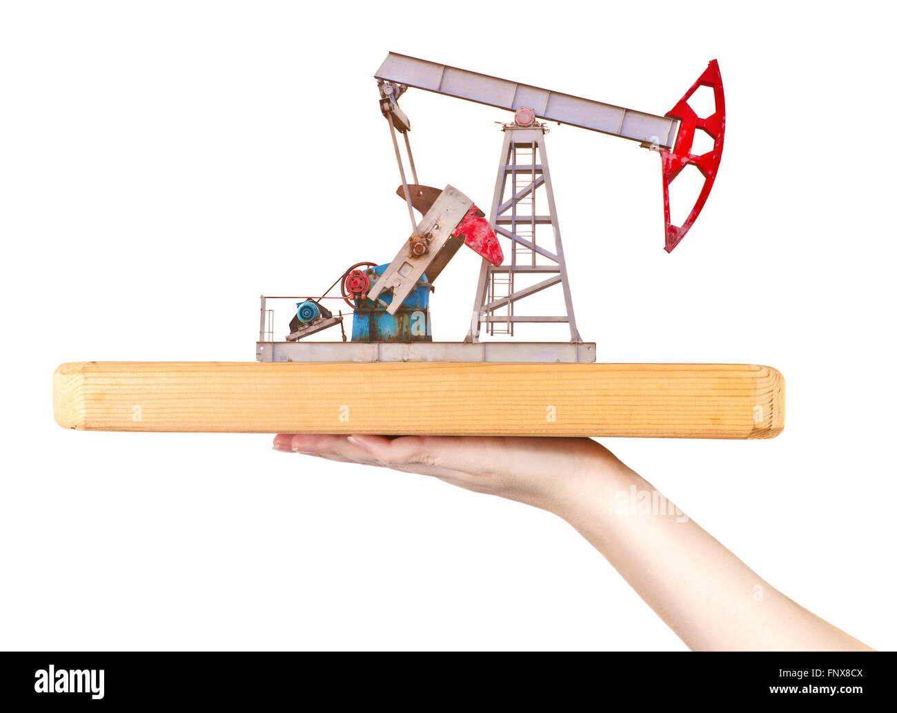 Pompe à huile sur une planche en bois sur un côté féminin Banque D'Images