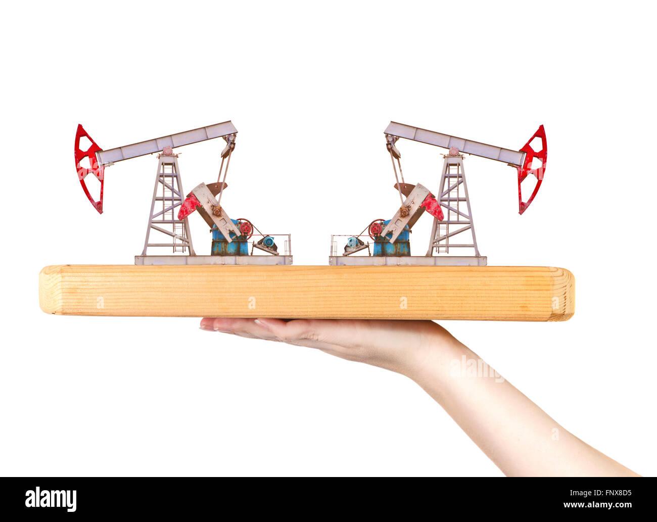 Pompe à huile sur une planche en bois sur un côté féminin Banque D'Images