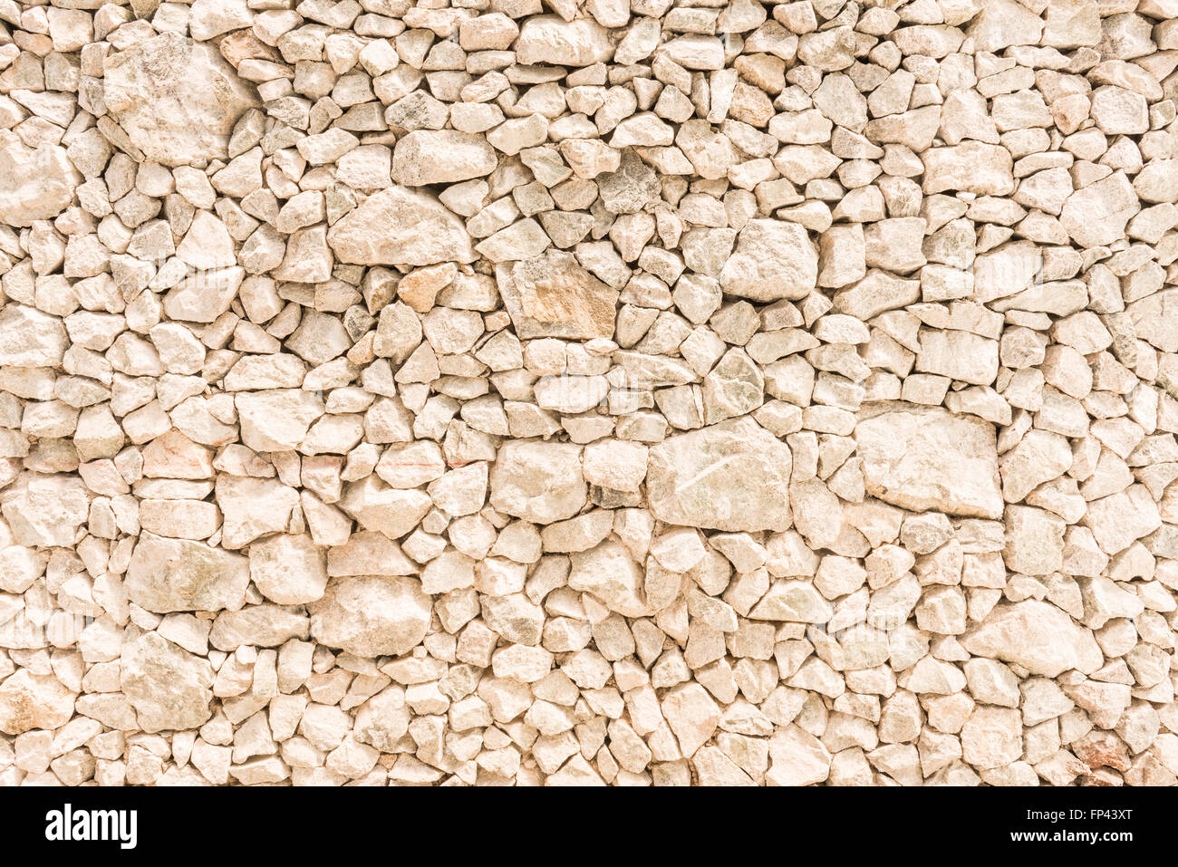 Les murs en pierre causé par le spectre de pierre de différentes tailles. Banque D'Images