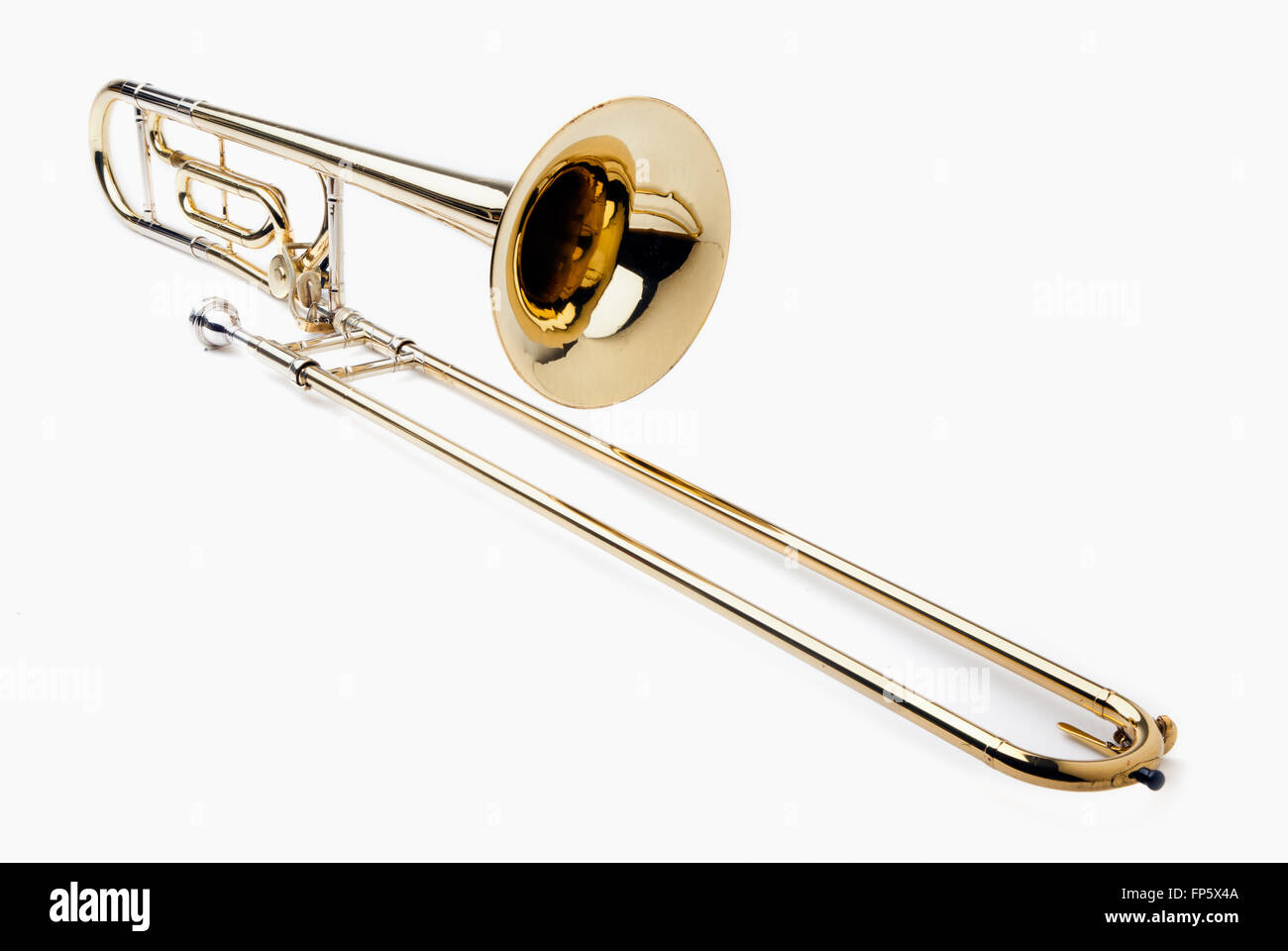 Faites glisser le trombone en cuivre isolé sur fond blanc Photo Stock -  Alamy