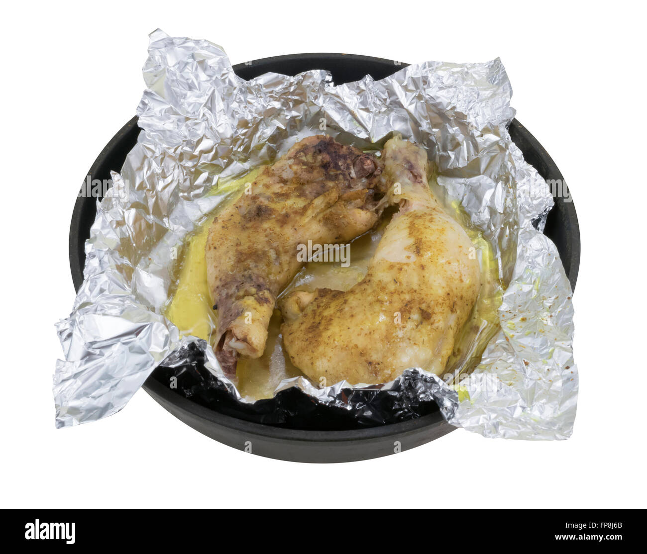 Le poulet cuit dans l'aluminium Banque D'Images