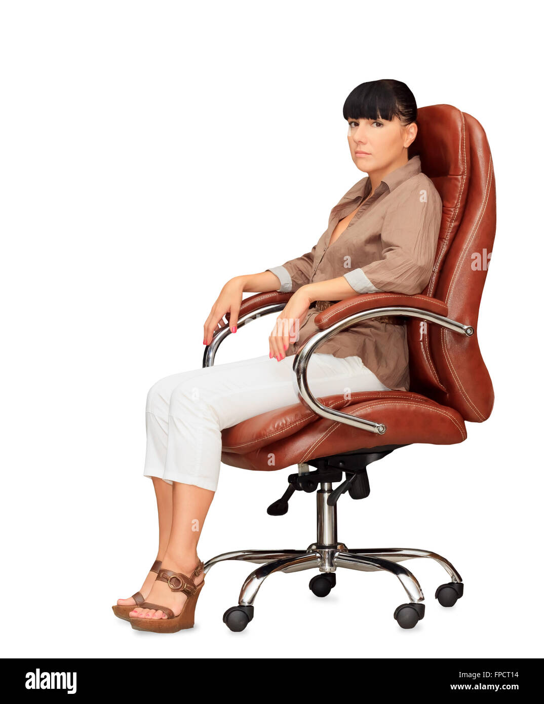 Woman sitting in office chair Banque D'Images