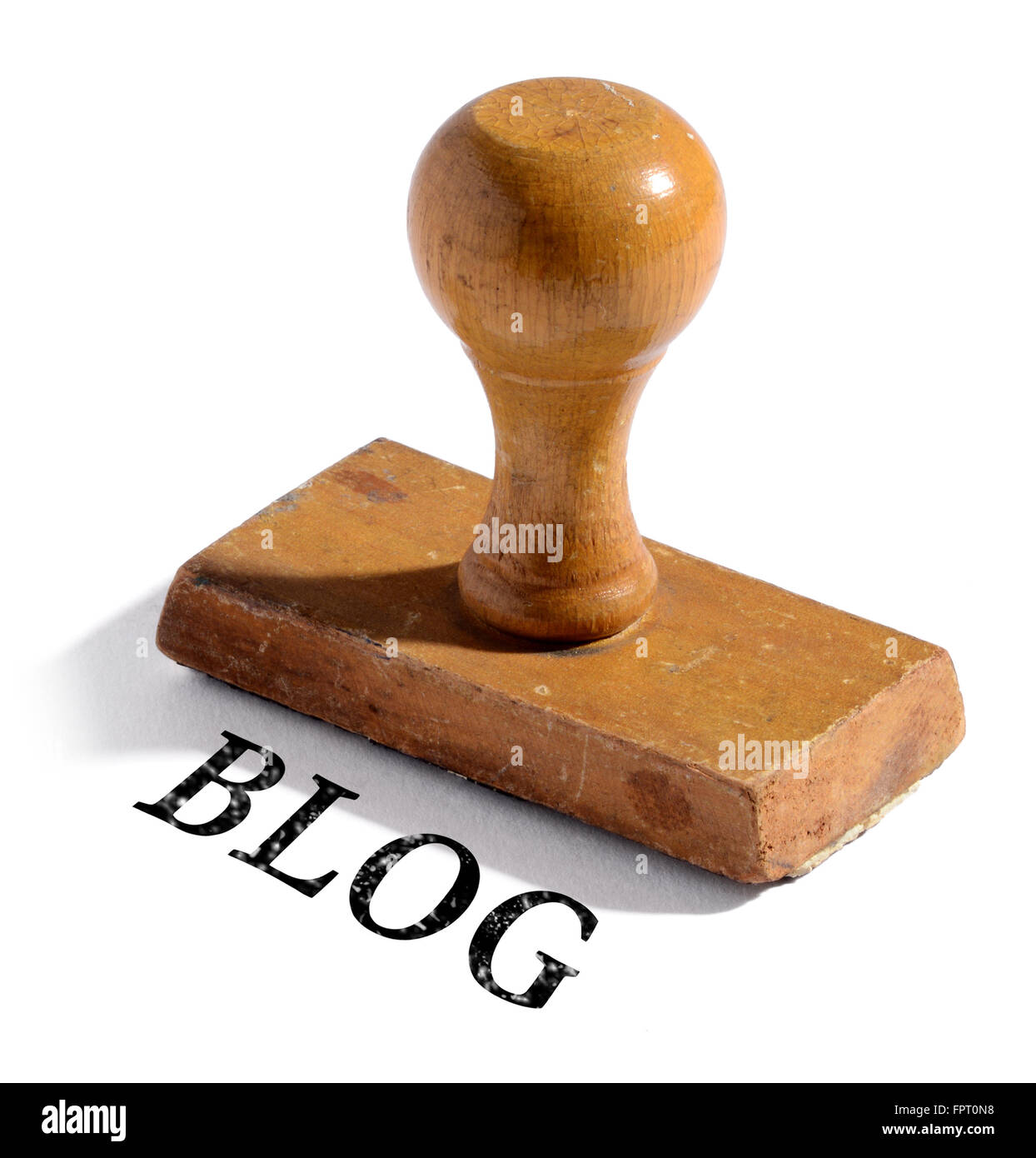 En bois à l'ancienne simple tampon de caoutchouc avec ombrage et blog texte sur fond blanc Banque D'Images
