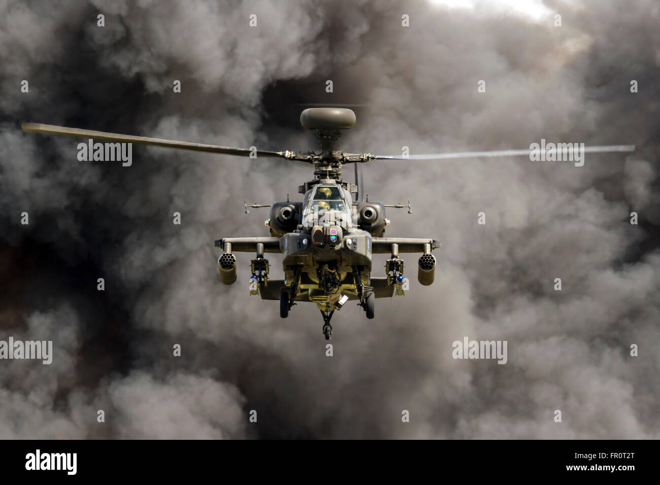 Apocalypse in Flight : Apache Gunship en action Banque D'Images