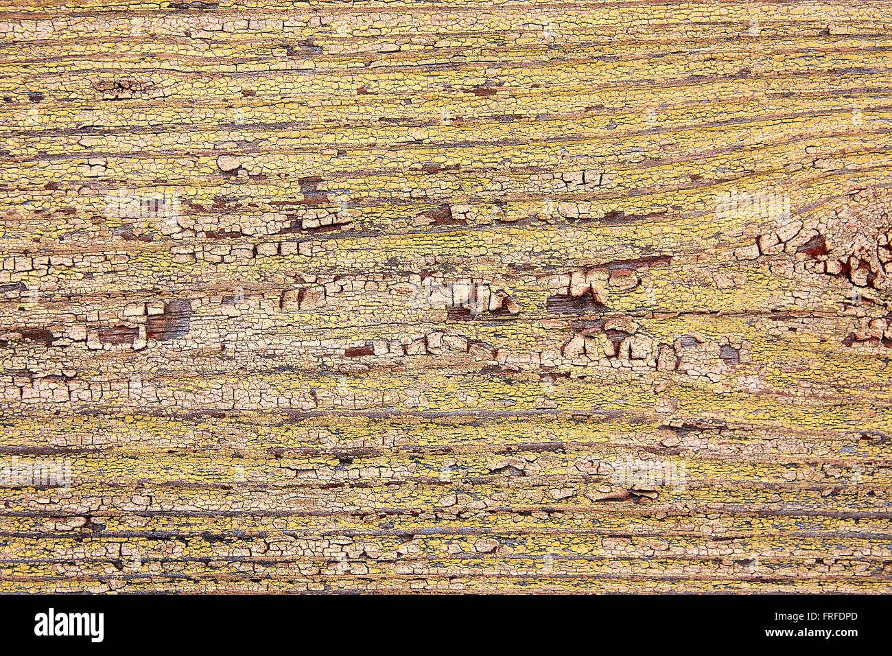 Texture bois avec peinture la couleur est arrachée. Peinture jaune écaillée - texture de fond en bois. Banque D'Images
