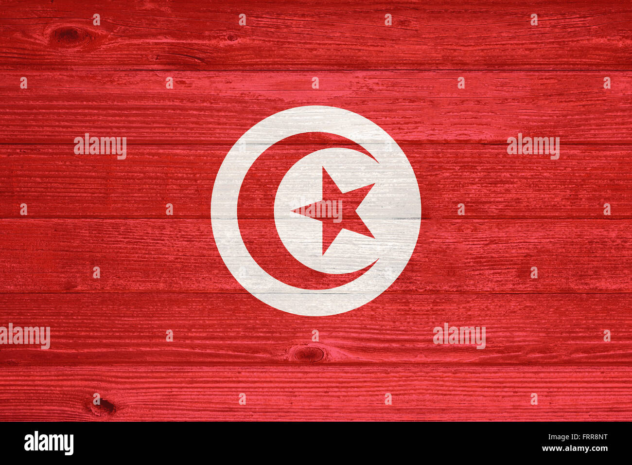 Drapeau de la Tunisie sur la planche en bois peint ancien fond Banque D'Images
