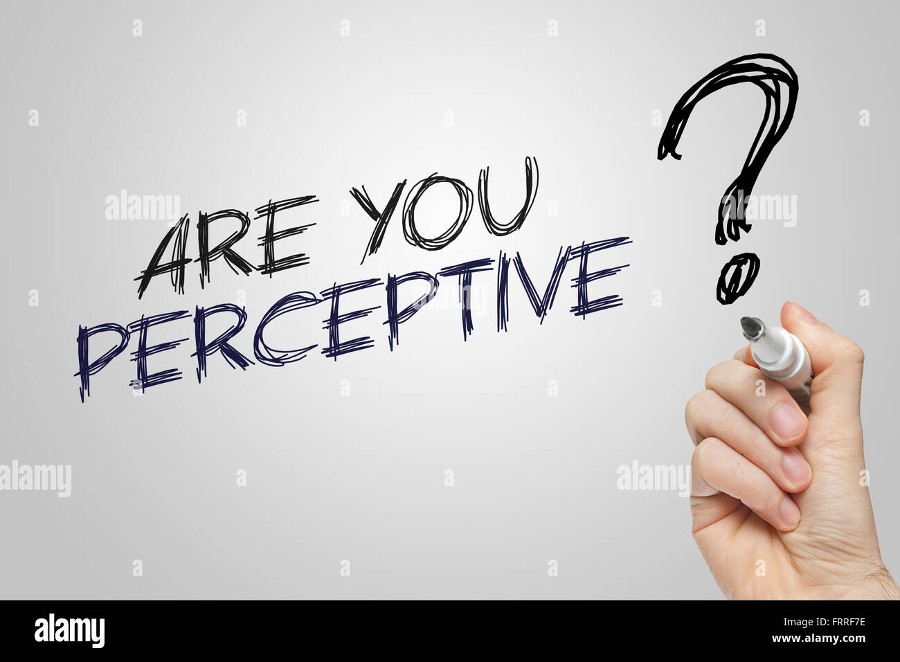 Perception la main sur fond gris Banque D'Images
