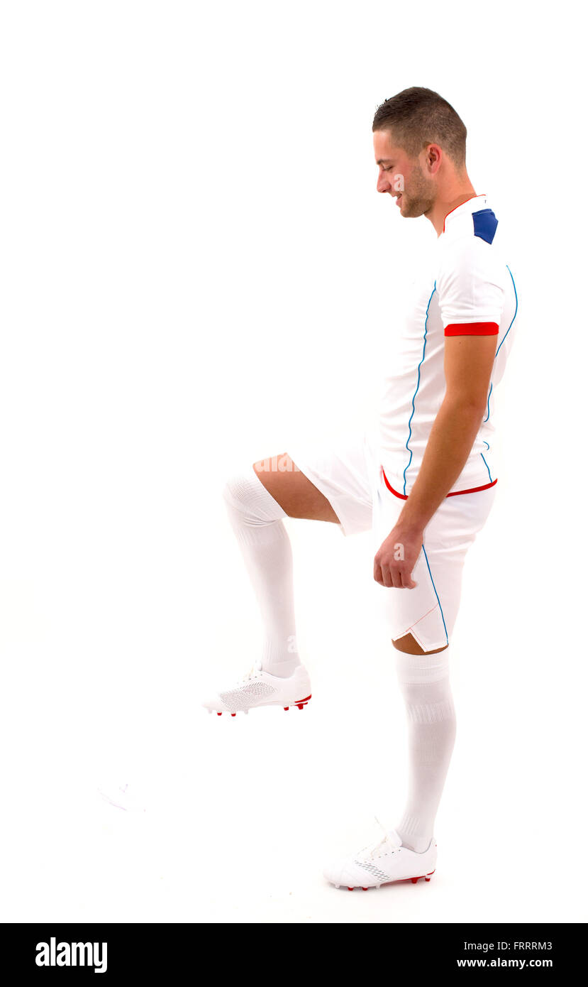 Portrait de joueur de football professionnel. Isolated on white Banque D'Images