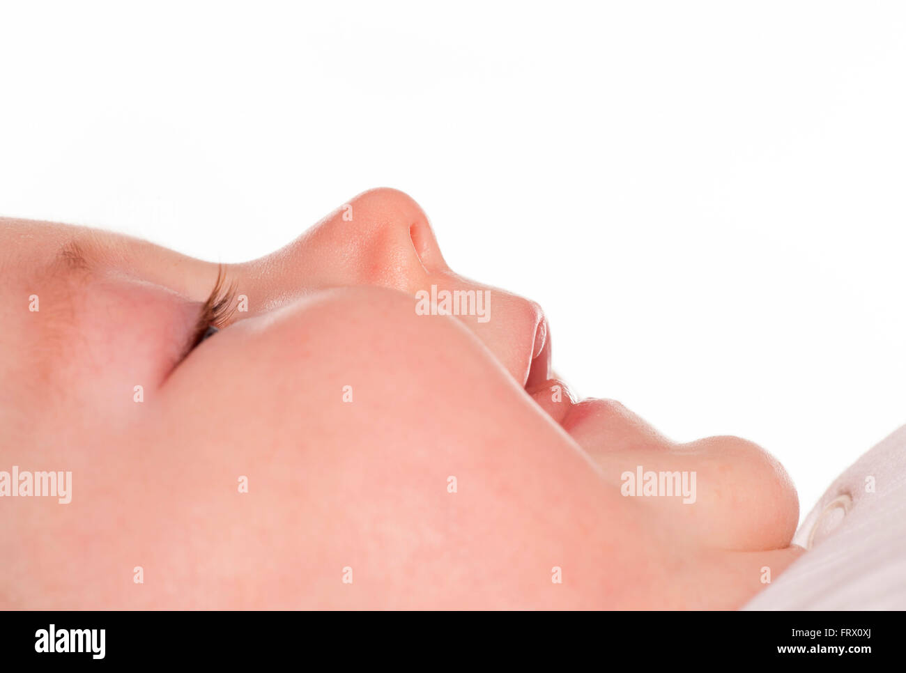 Baby Girl laughing résumé fond blanc Banque D'Images