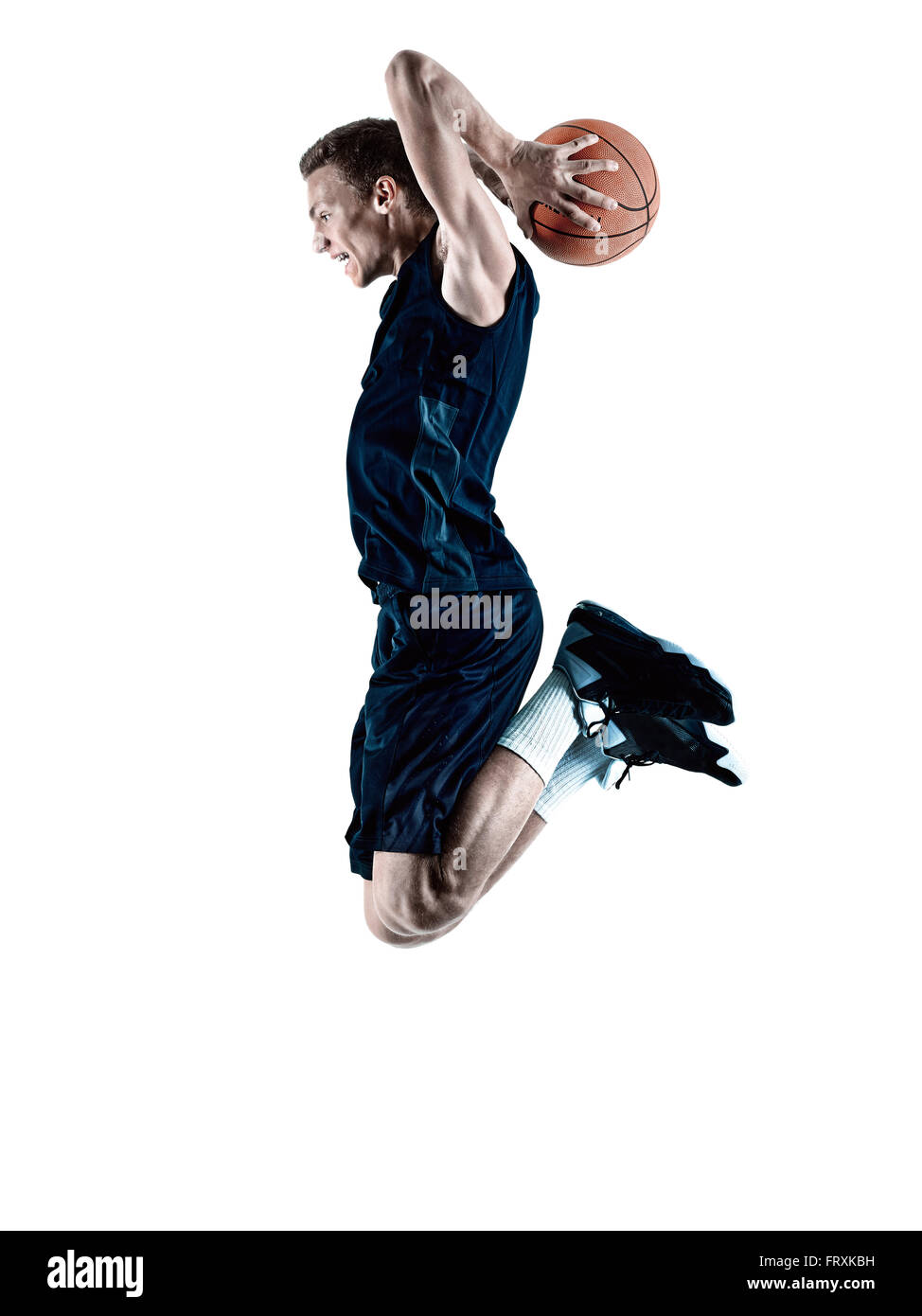 Un joueur de basket-ball man en silhouette isolée sur fond blanc Banque D'Images