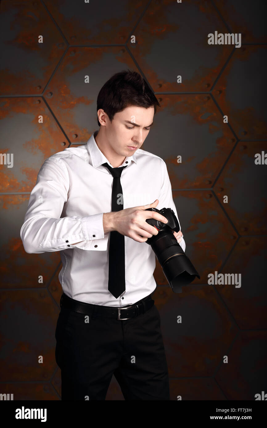 Photographe professionnel de mariage est photos défilement Banque D'Images