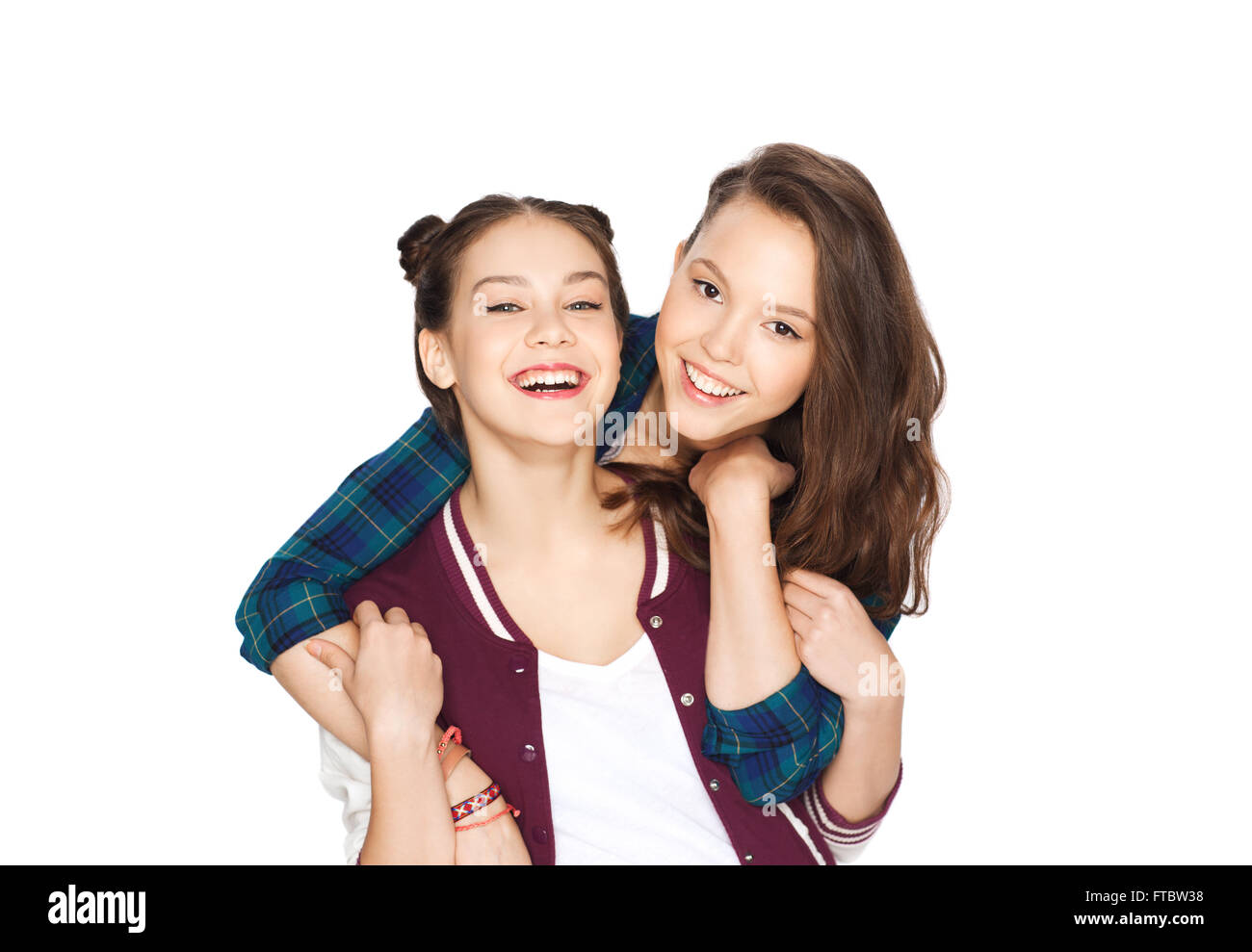 Happy smiling pretty teenage girls hugging Banque D'Images