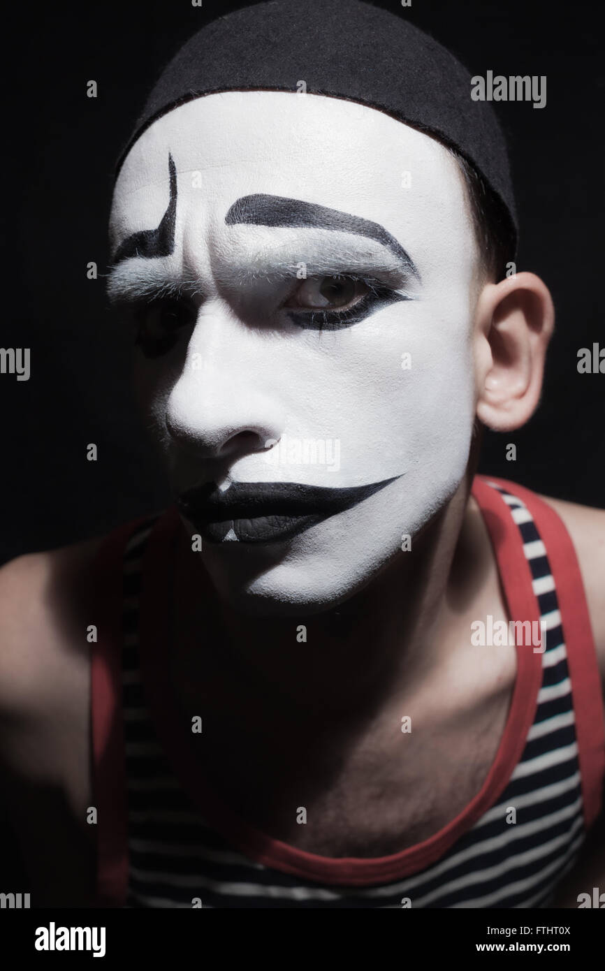 Visage de mime fctor sur fond noir Banque D'Images