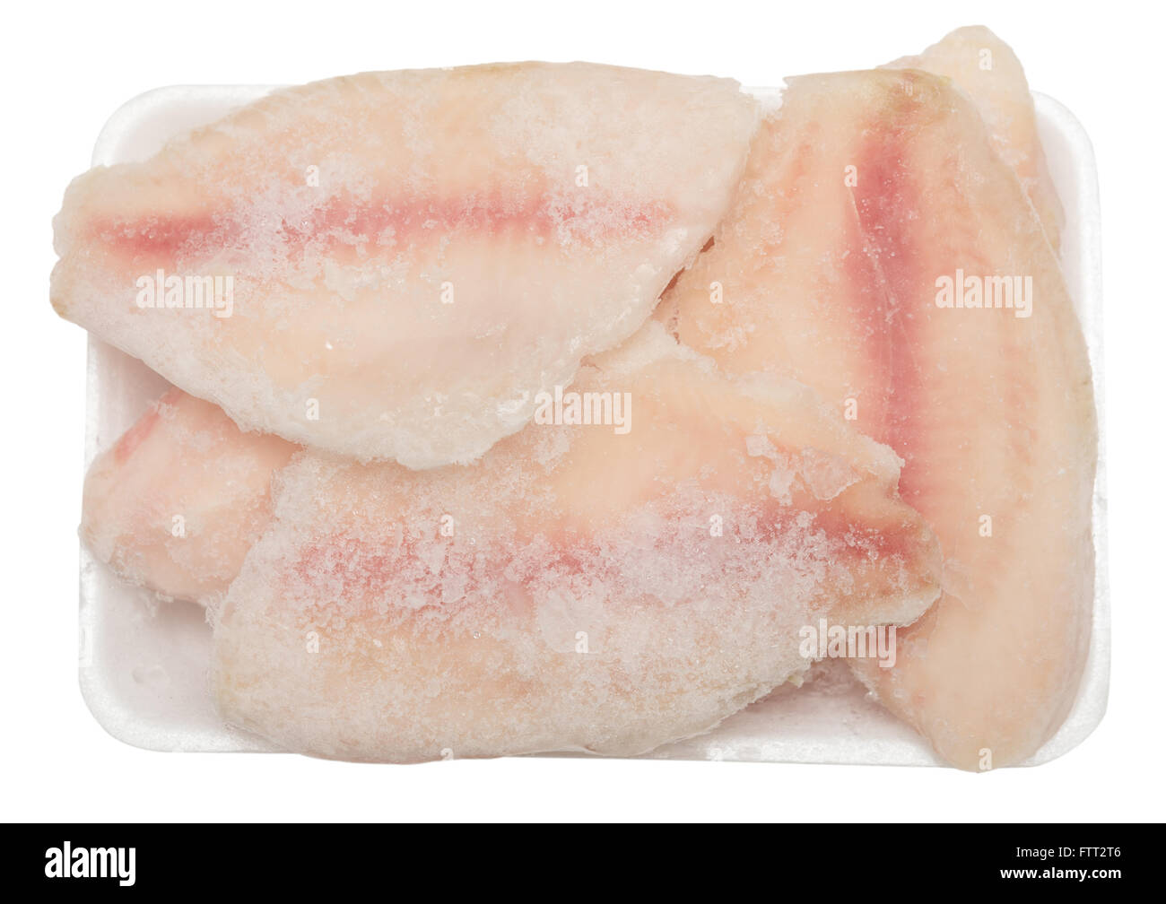 Filet de poisson congelé isolé sur fond blanc Photo Stock - Alamy