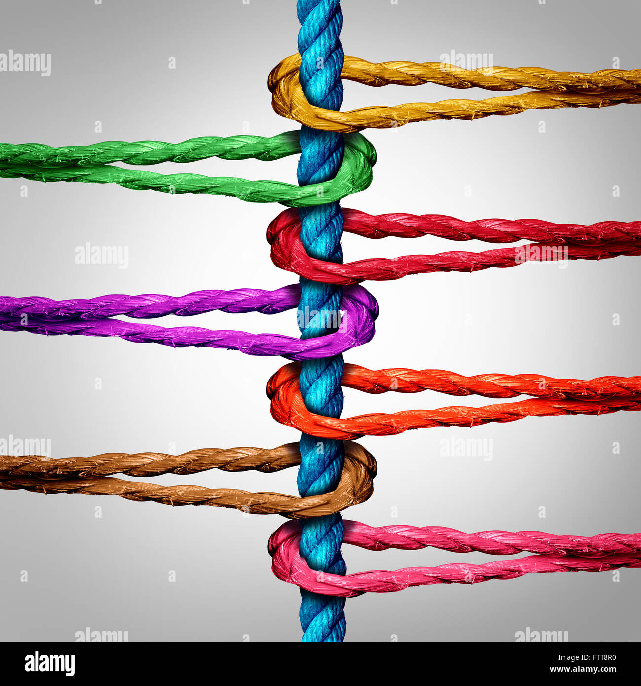 Connexion centrale concept d'entreprise comme un groupe de cordes différents connectés à un réseau central d'acier à la métaphore de la connectivité et d'un lien vers une structure de soutien centralisé. Banque D'Images
