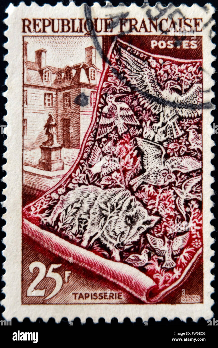 FRANCE - circa 1954 : timbre imprimé en France montre et tapisserie Gobelin Atelier, vers 1954 Banque D'Images