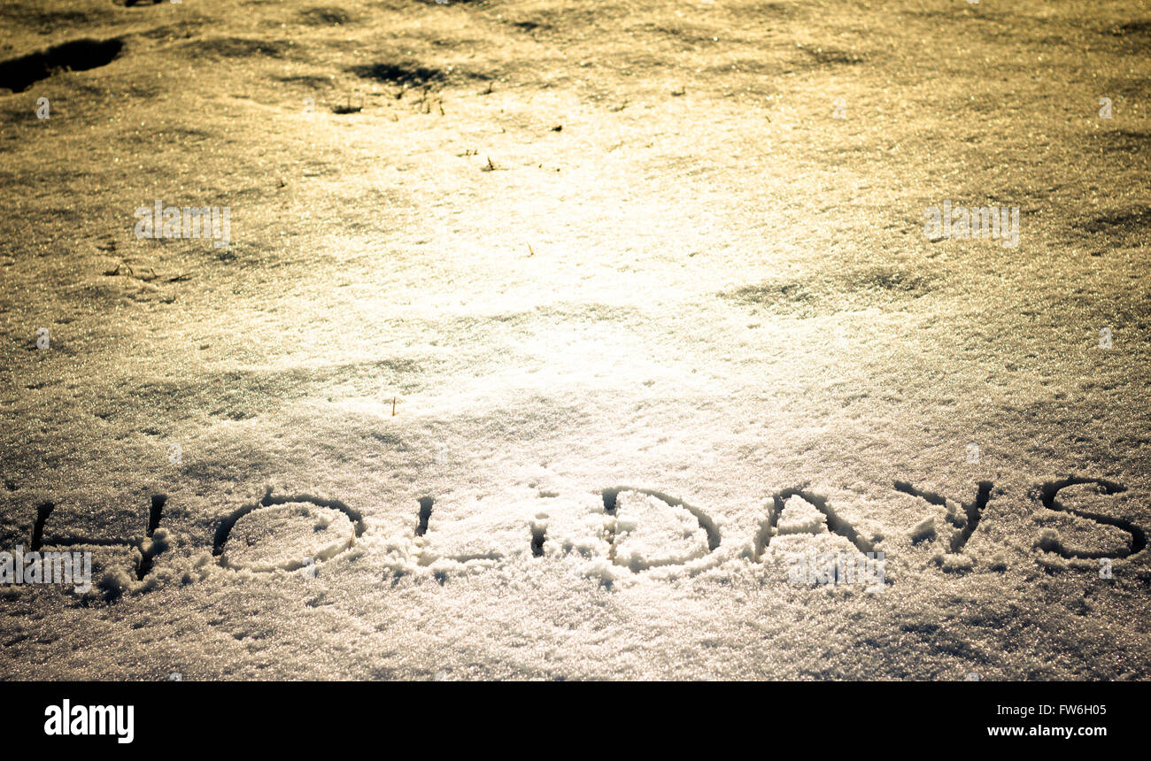 Les mots écrits sur un champ de neige Vacances Banque D'Images
