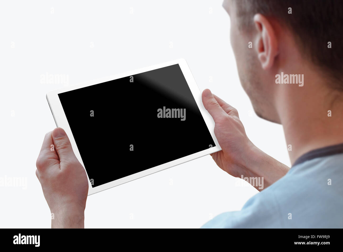 Tablette avec écran isolé pour homme dans la maquette des mains. Isolé sur fond blanc. Écran de l'appareil isolé pour la conception, l'interface Banque D'Images