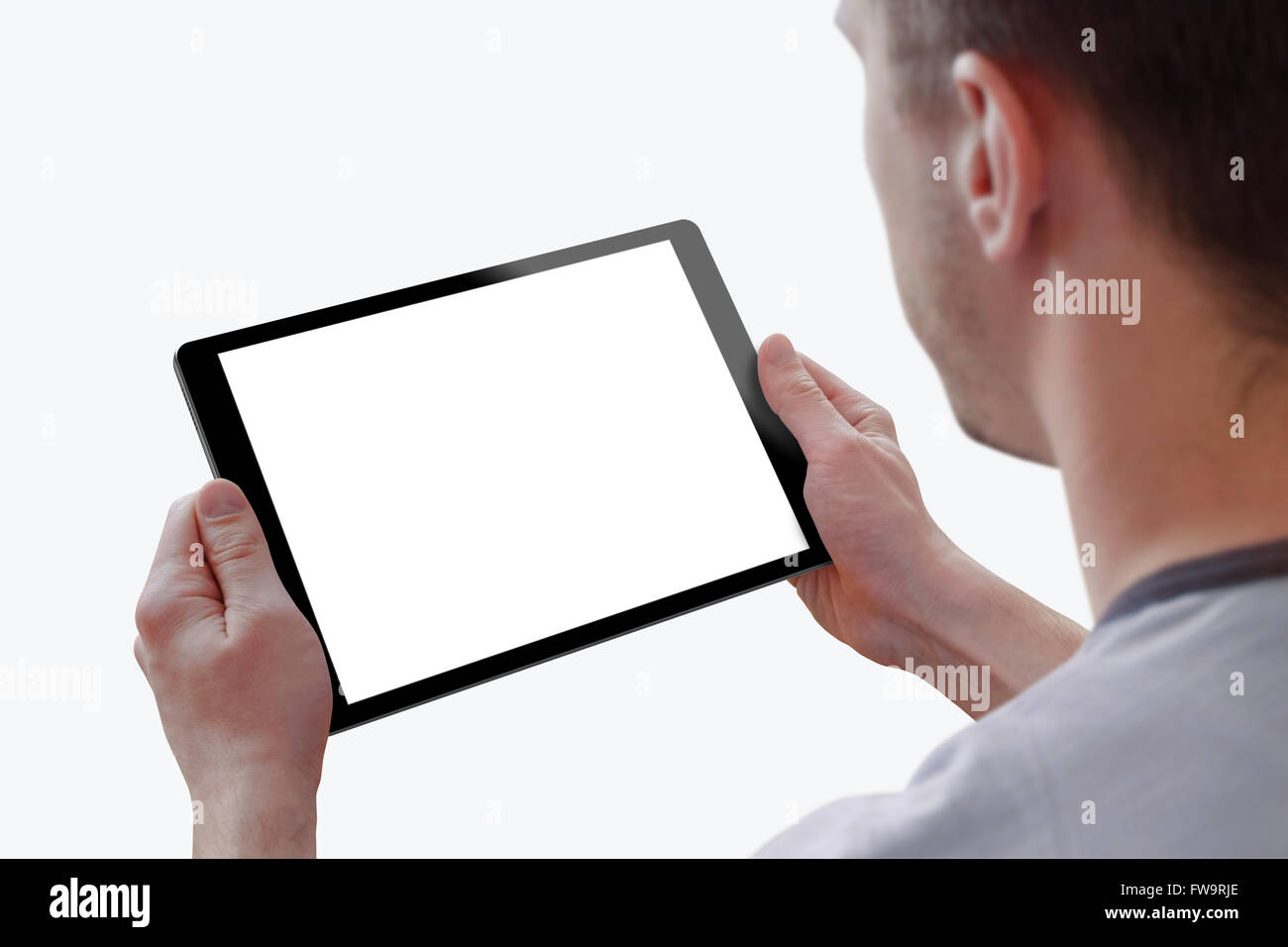 Tablette avec écran isolé pour homme dans la maquette des mains. Isolé sur fond blanc. Écran de l'appareil isolé pour la conception, l'interface Banque D'Images