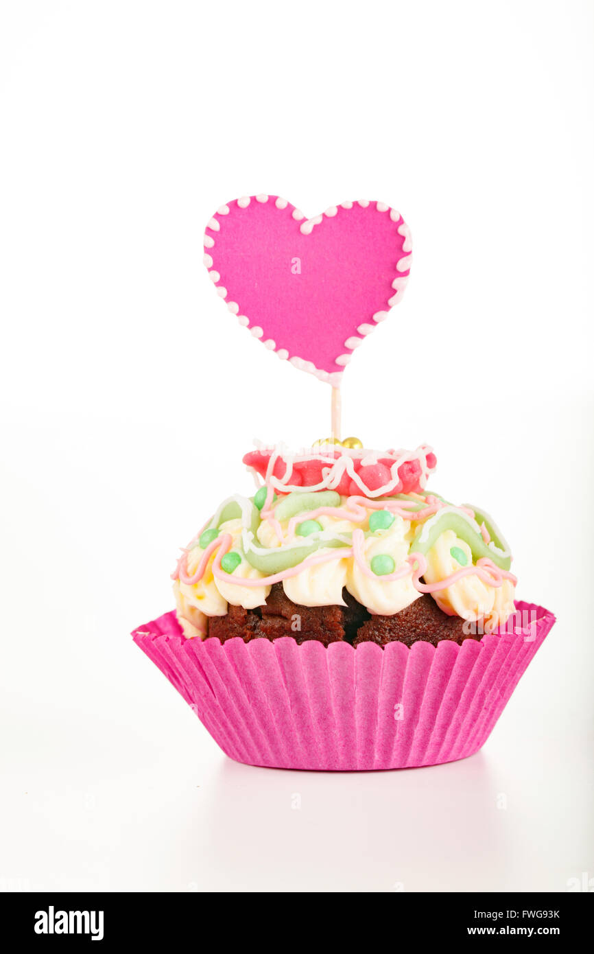 Cup Cake avec coeur décoration. Banque D'Images