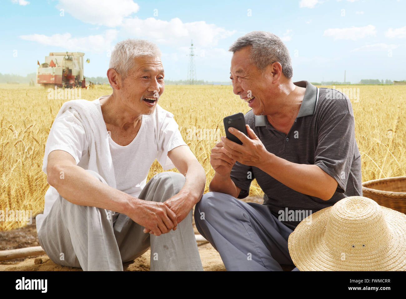 Deux agriculteurs dans la zone de parler Banque D'Images