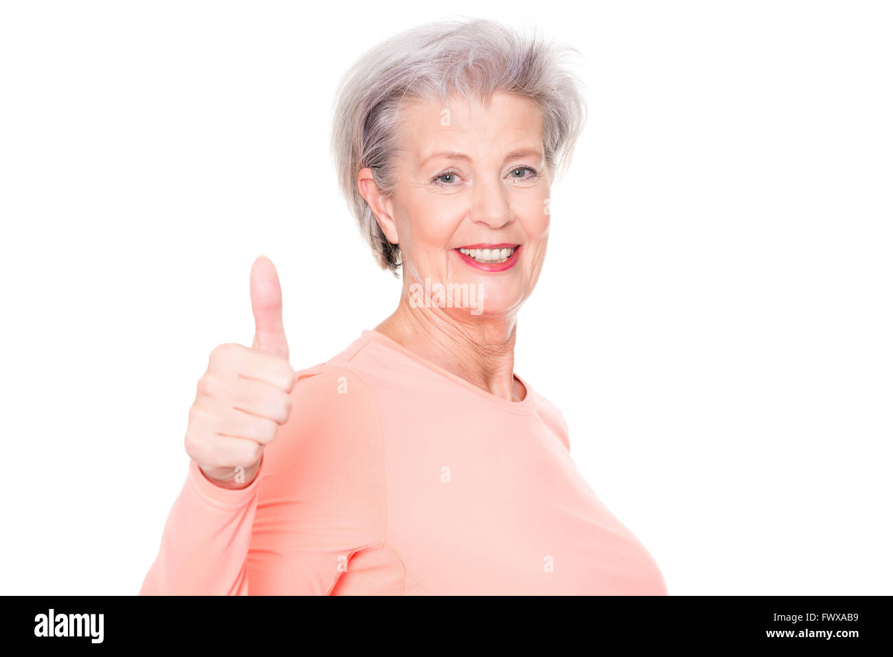 Sportive et active senior woman in front of white background Banque D'Images