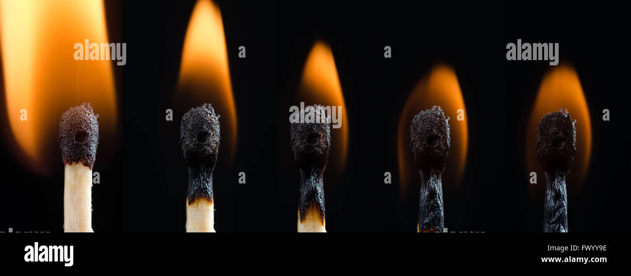 Gravure de progrès dans le temps, match isolé sur backgorund noir. Banque D'Images