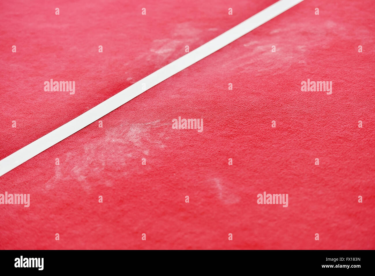 Détail tourné avec gymnastique rouge marbre et des traces de craie Banque D'Images