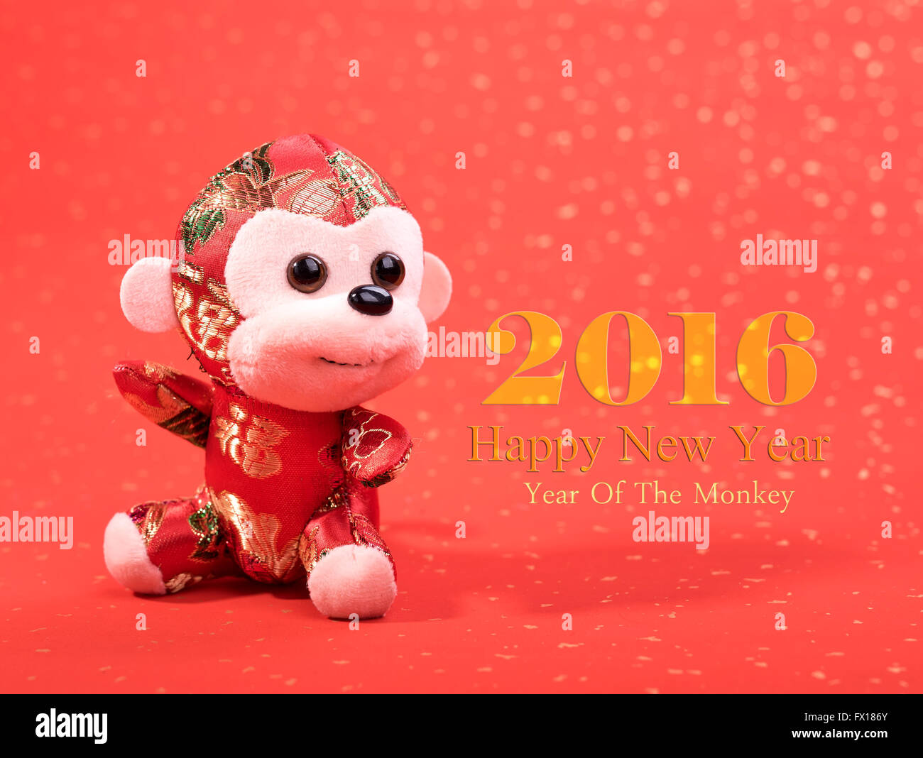 Nouvel an chinois jouet ornements de singe sur fond de fête Banque D'Images