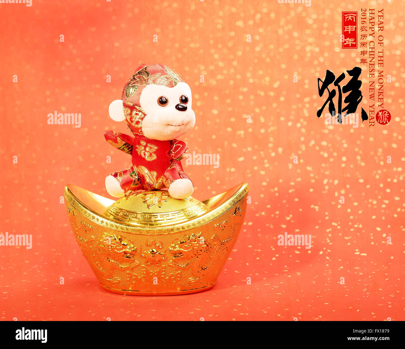 Nouvel an chinois jouet ornements de singe sur fond de fête Banque D'Images