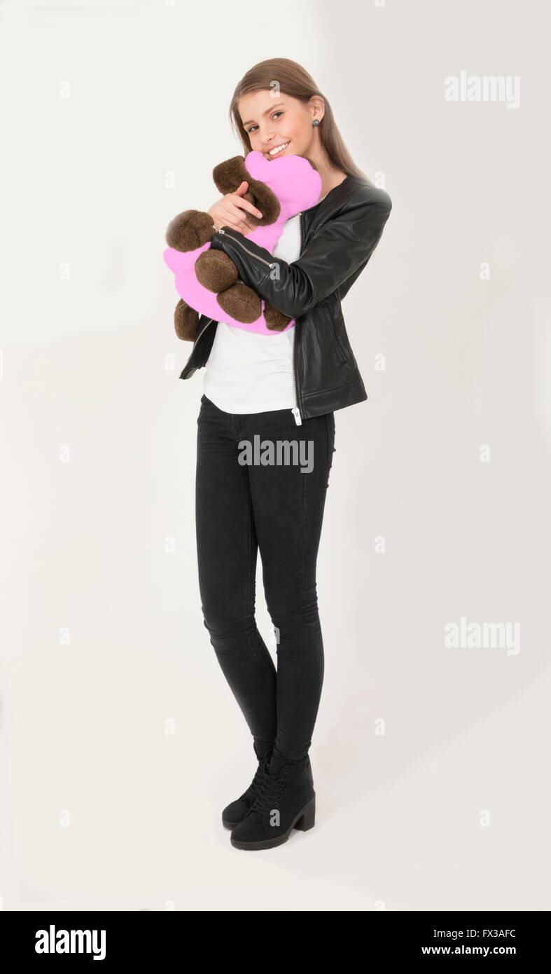 Teenage girl with cute soft toy Banque D'Images