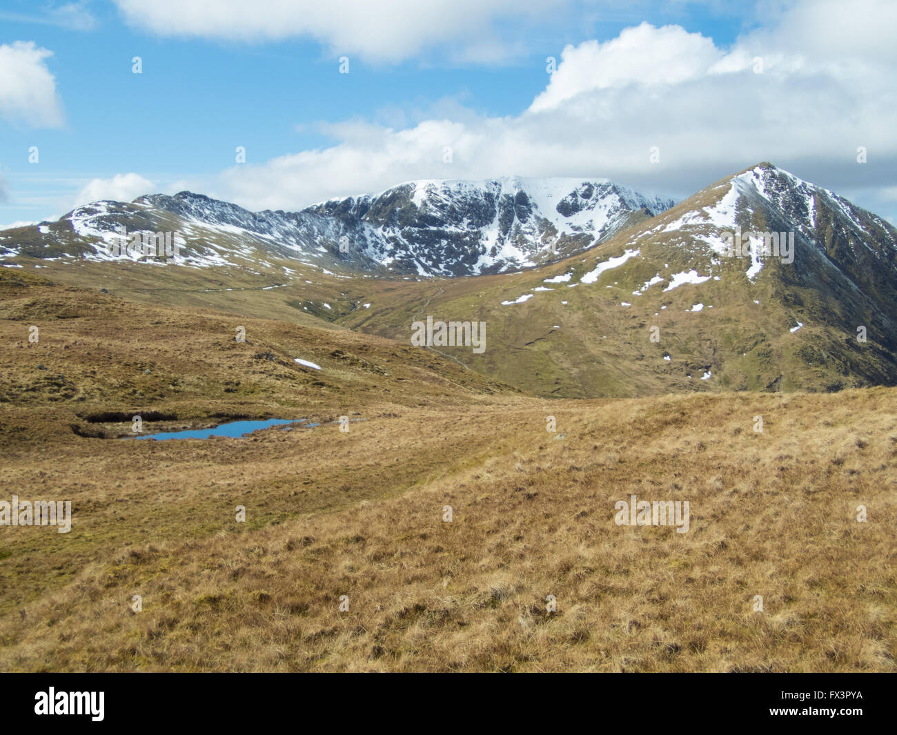 L'helvellyn gamme de montagne à la fin de l'hiver. parc national de lake District, Cumbria, Angleterre. Banque D'Images