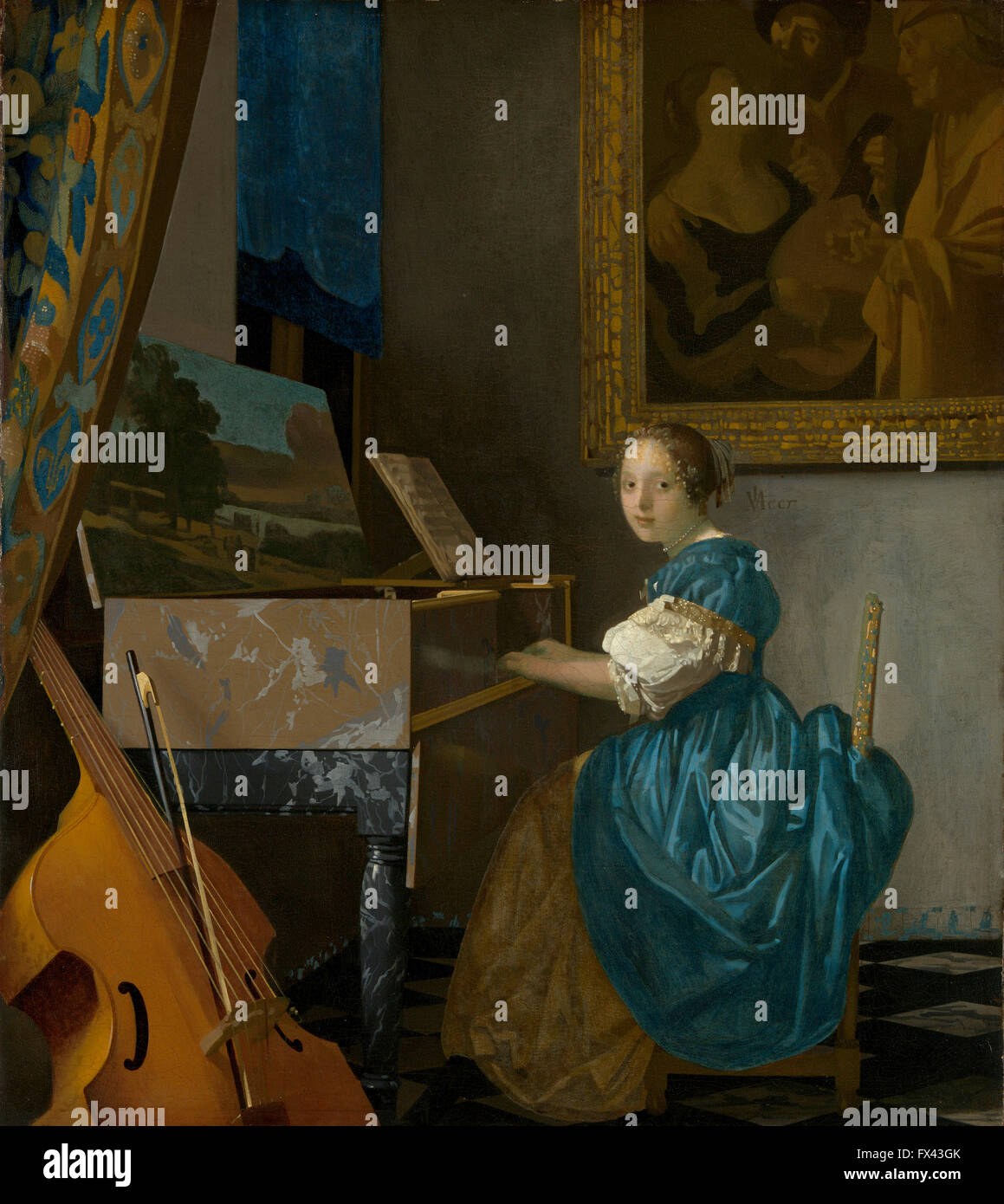 Dame assise à l'épinette par Vermeer Banque D'Images