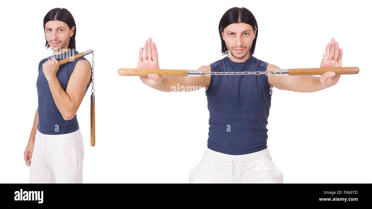 Funny karate fighter avec nunchucks on white Banque D'Images