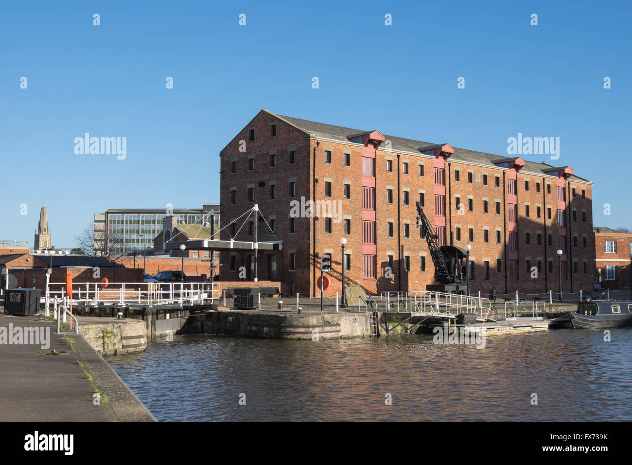 Les entrepôts et les quais à Gloucester grue à vapeur Banque D'Images
