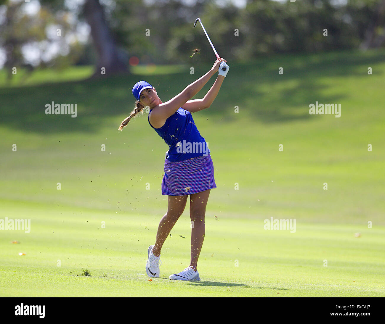 13 avril 2016 - Cheyenne Woods hits son tir d'approche pour le 18ème green au cours de la première ronde de la Lotte Championship présenté par Hershey à Ko Olina Golf Club à Kapolei, HI Banque D'Images