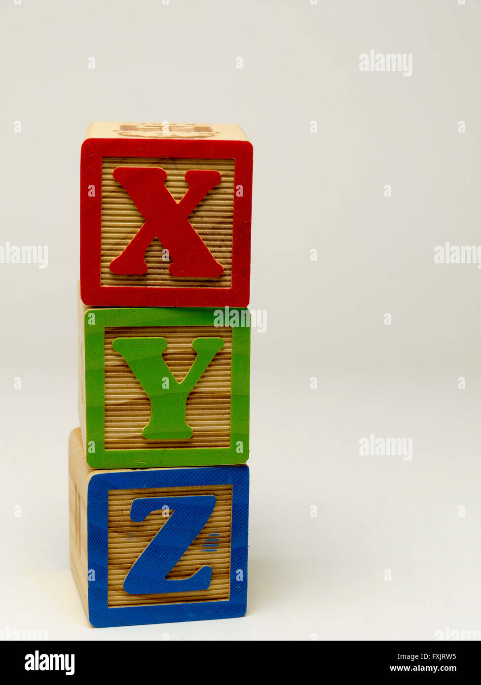 Kid's building blocks spelling le mot xyz. Banque D'Images