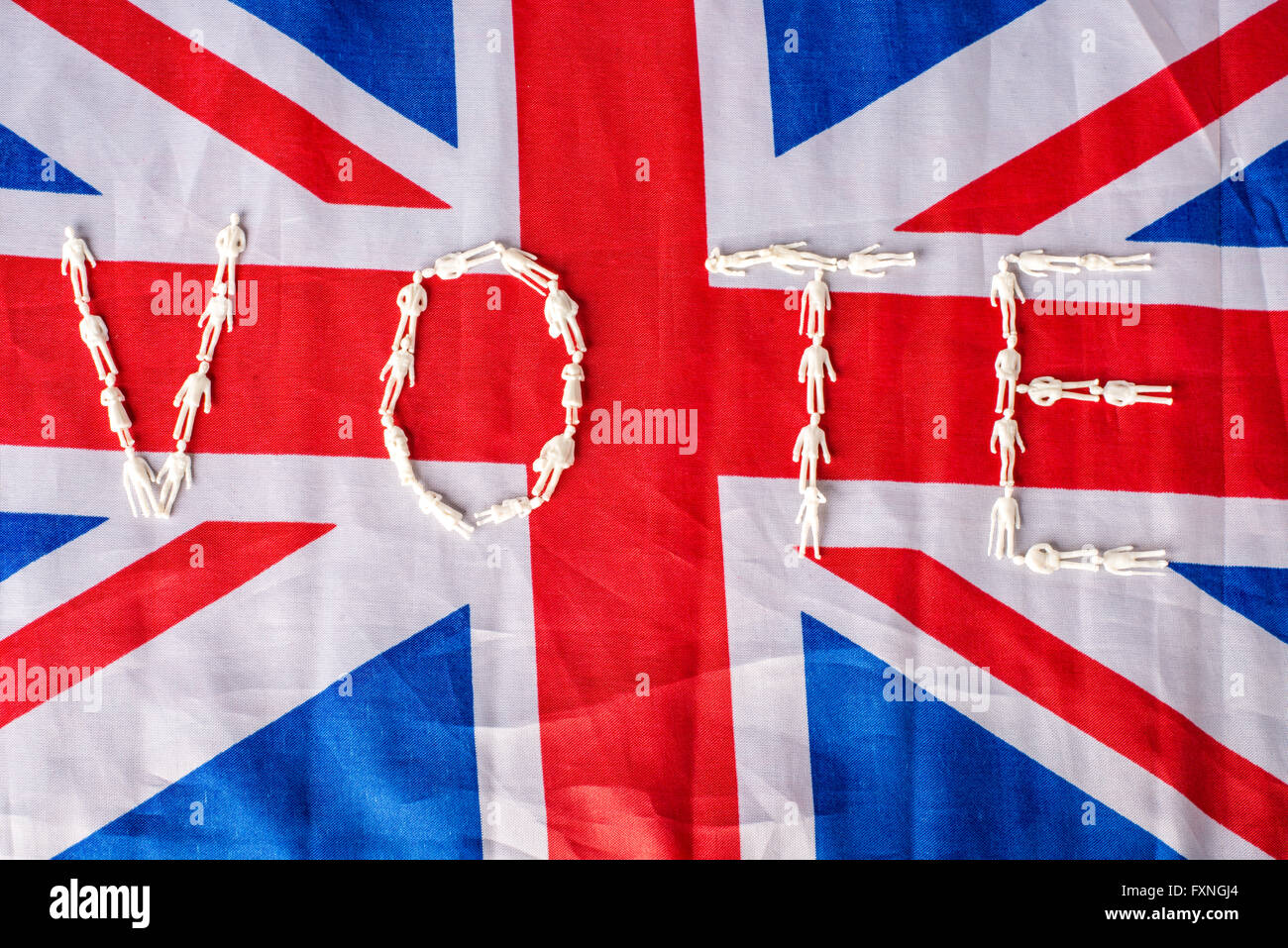 Voter enseigne sur un drapeau britannique fait des chiffres blancs Banque D'Images