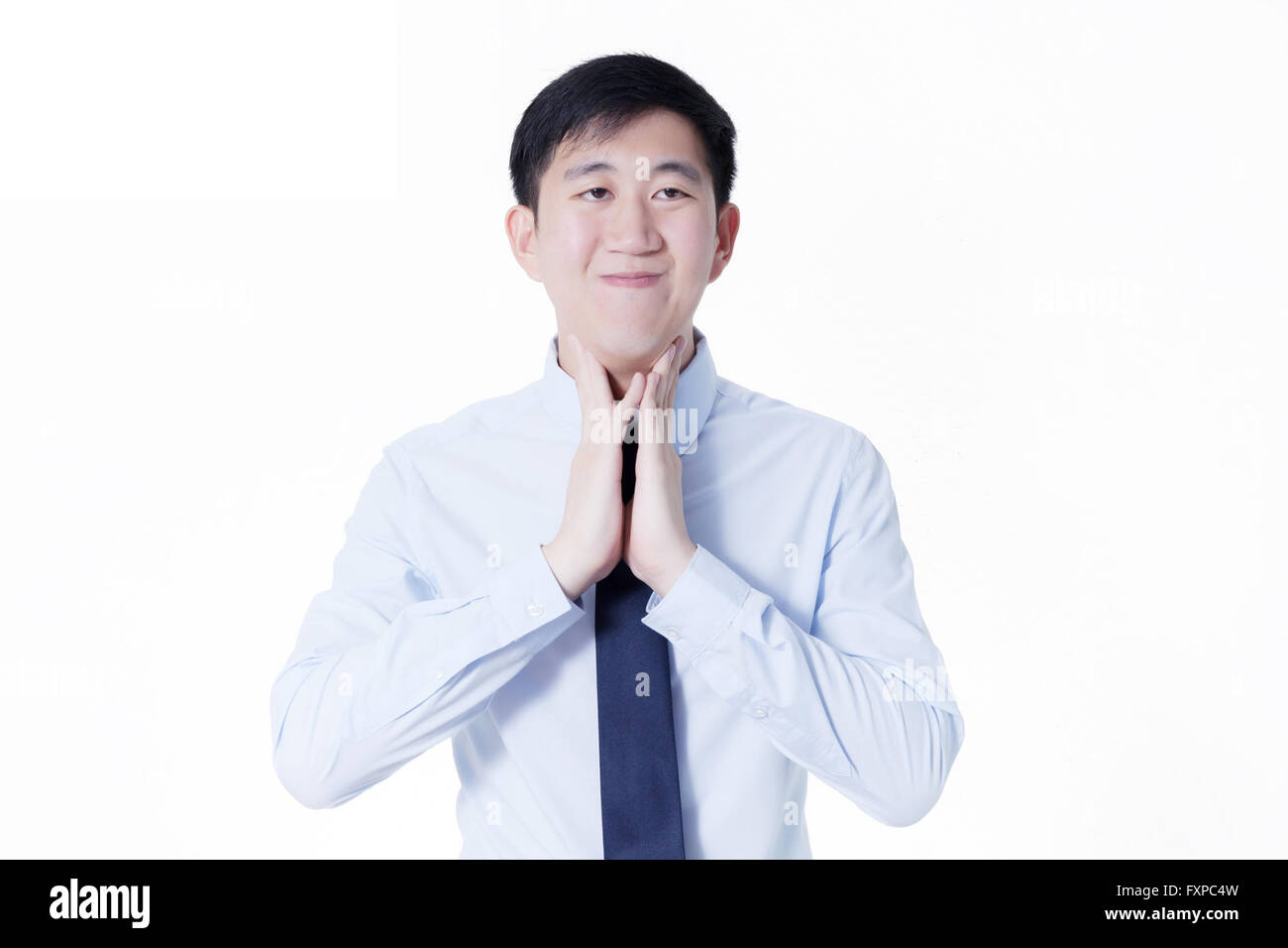 Jeune homme asiatique ayant mal de gorge / maladies liées à la gorge Banque D'Images