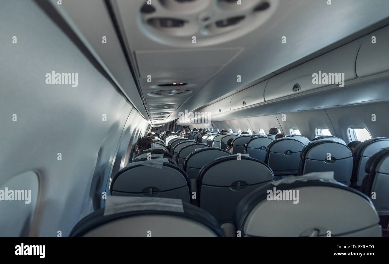 Avec les passagers de l'avion d'intérieur Banque D'Images